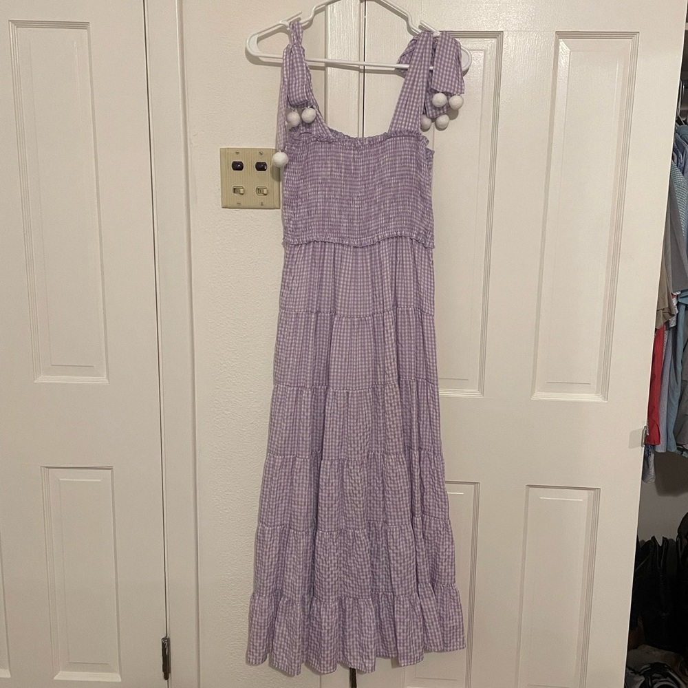Lavender/white flowy maxi dress. Adjustable ties on shoulder. Very comfy.